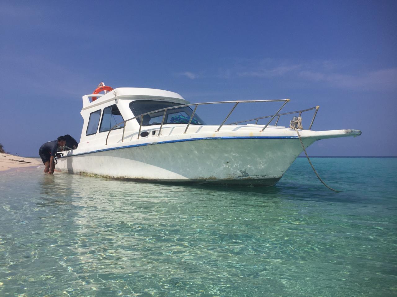 a white boat in komodo island