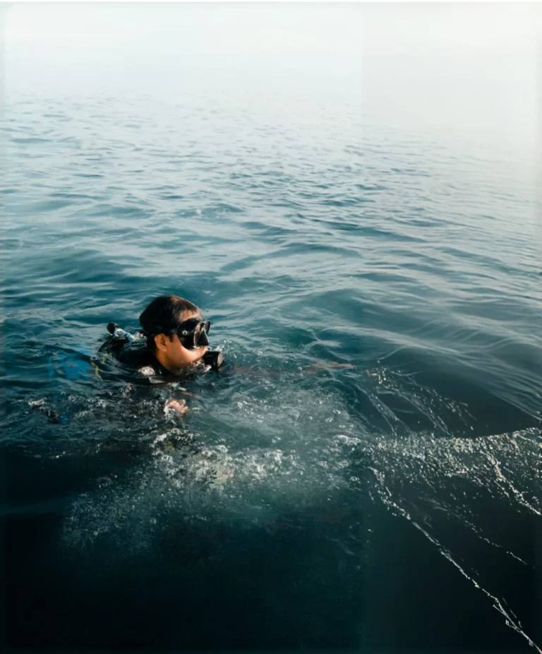 Scuba diver being left behind